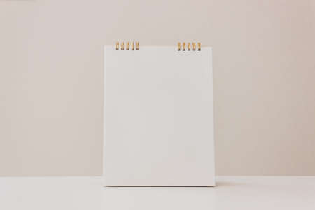 A white note on table over the light background.の写真素材