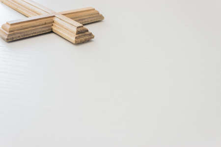 A wooden cross on table.の写真素材