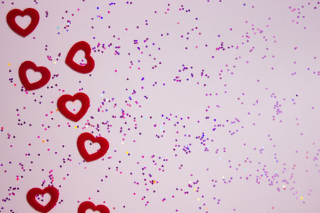 Red hearts confetti on a white background. Valentine's Day.の写真素材