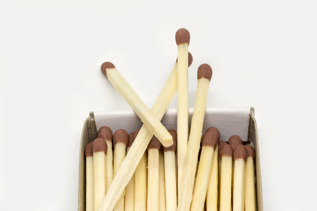A close-up of wooden matches in a boxの写真素材