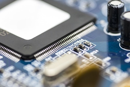 microchips and circuits on a boardの写真素材