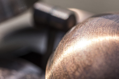 macro shot of a bell of an old watchの写真素材