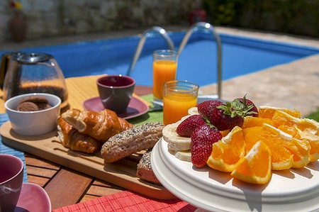 healthy breakfast at pool sideの写真素材