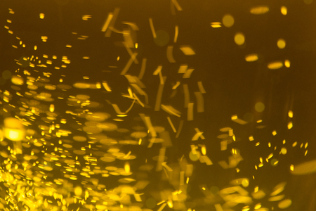 Macro shot of drops of beer inside a glassの写真素材