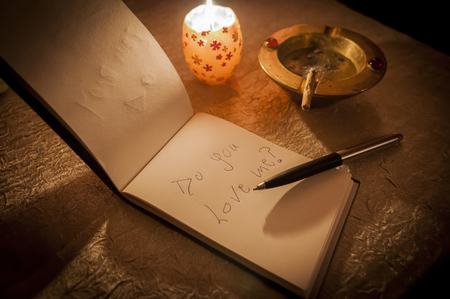 asking for love and trust with a letterの写真素材