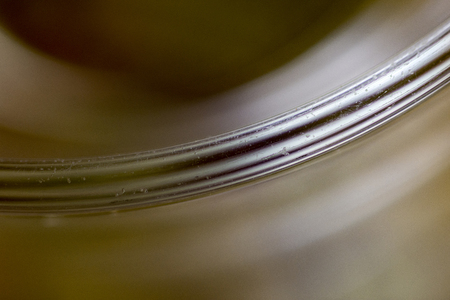 abstract macro shot of the lip of a glassの写真素材