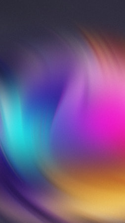 Abstract swirls of vibrant purple blue teal orange and pink blend smoothly with a subtle grainy texture.の写真素材