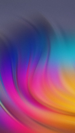 Swirling abstract gradient of vibrant pink blue yellow and purple colors with soft textureの写真素材