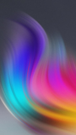 Swirling abstract gradient of vibrant blue pink yellow and purple colors with soft light and smooth textureの写真素材