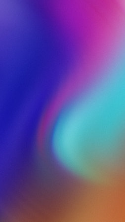 A soft gradient swirls with blue purple pink teal and orange hues creating a smooth fluid abstract background.の写真素材