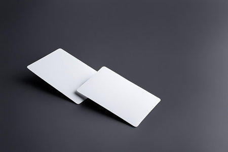 A sleek and modern business card mockup displayed on a dark background, showcasing a clean and professional design.の素材