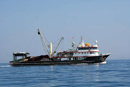 Fisher ship in the sea