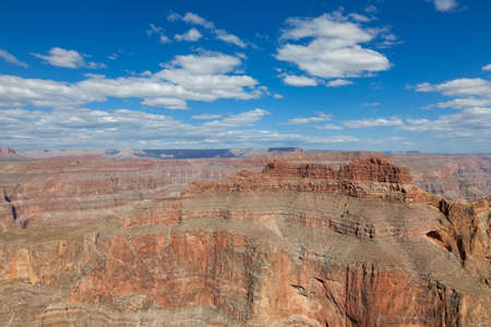 Grand canyon in sunny day with blue sky and cloudsの写真素材