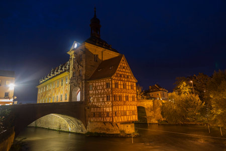 Obere bridge (brÃ¼cke) and Altes Rathaus at night in Bamberg, Germanyの写真素材