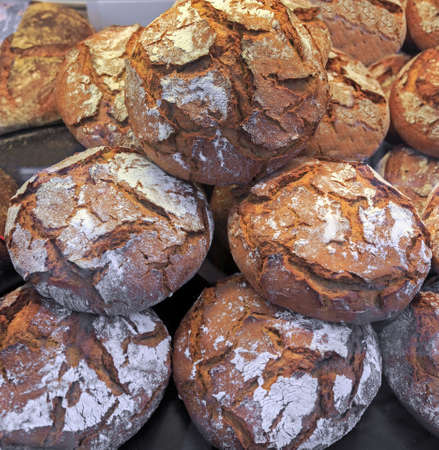 Fresh baked bread with flour, closeup viewの写真素材