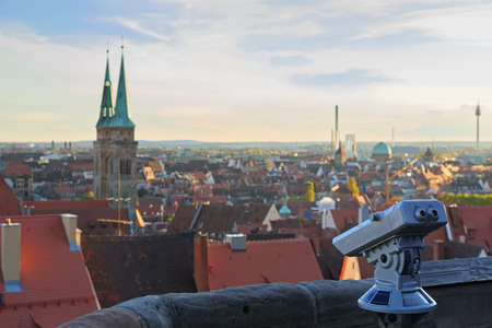 Telescope in the Nuremberg castle, view of the city, church, sky, cloudsのeditorial素材