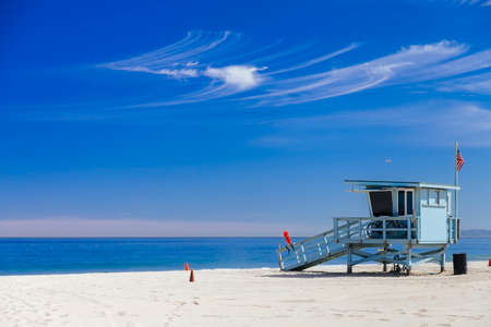 Lifeguard station with american flag on Hermosa beach.の写真素材