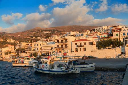 Fishing boats in the bay of greek village at sunrise