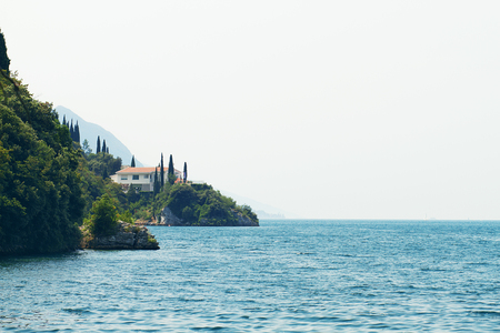 Palace on Lake Garda in Italy. Horizontal shot. Lake Garda is the largest lake in Italy. It is located in Northern Italy.の写真素材