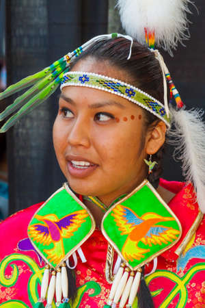 SANTA FE, NEW MEXICO, USA - AUGUST 18, 2013: Santa Fe Indian Market,  Native American young woman, traditional costune Annual eventのeditorial素材