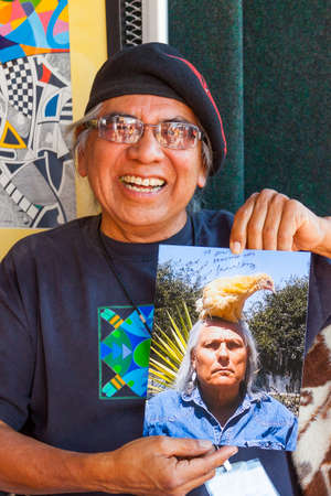 SANTA FE, NEW MEXICO, USA - AUGUST 18, 2013: Santa Fe Indian Market, Artist displaying work at the  Annual Eventのeditorial素材