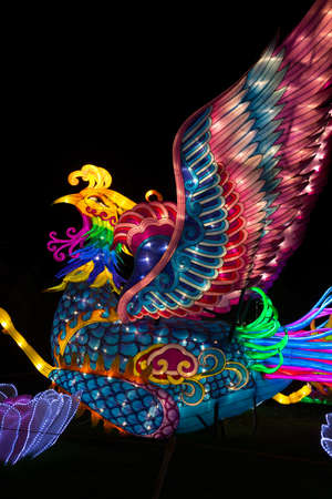 ALBUQUERQUE, NEW MEXICO, USA - NOVEMBER 29, 2018: Dragon Lights Albuquerque, Silk Phoenix lantern. Silk lanterns a Chinese traditional art celebrates the Chinese New Year. Handcrafted by artisans from Zigong, Chinaのeditorial素材