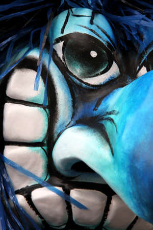 Closeup of a single basel carnival mask with blue, turquoise, white and black color.の写真素材