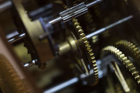 Details of an old swiss automatic clockwork with intricate partsの写真素材