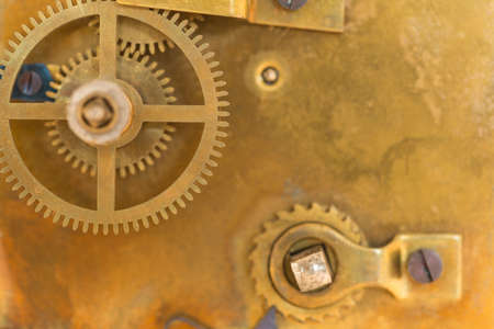 Details of an old swiss automatic clockwork with intricate parts