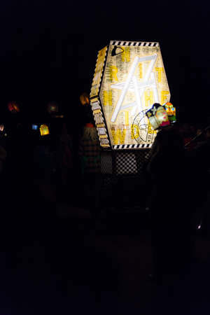 One of the main lanterns of a Basel carnival group, illuminated during the parade on Monday morning 4 a.m. Picture taken on 15 February 2016 in the old town of Basel, Switzerland.のeditorial素材