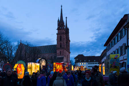 Basel carnival. Muensterplatz, Basel, Switzerland - March 7, 2017. All main carnival lanters are displayed on the big church square for visitors to enjoy.のeditorial素材