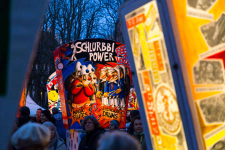 Basel carnival. Muensterplatz, Basel, Switzerland - March 7, 2017. View on illuminated main lanterns displayed on the main church square.のeditorial素材