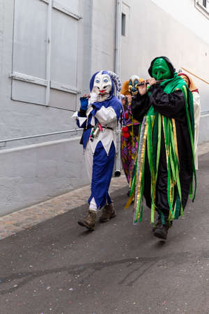 Archivgaesslein, Basel, Switzerland - March 12th, 2019. Close-up of a small disguised group of piccolo flute playersのeditorial素材