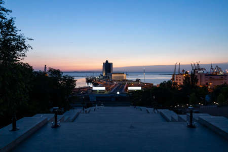 Ukraine, Odessa, Primorsky Boulevard, 13th of June 2019. View down the Potemkin Stairs on the seaport and the Hotel Odessa at dawn.のeditorial素材