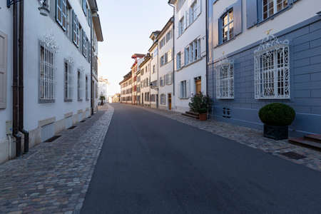 Switzerland, Basel, Augustinergasse, 3rd of August 2019. View down a street with medieval buildings...