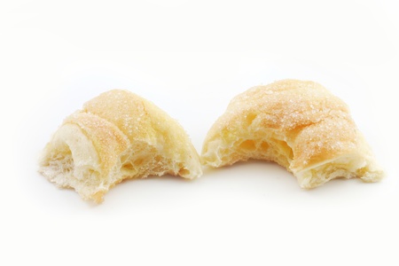 Sprinkle buttered brown bread isolate.の写真素材