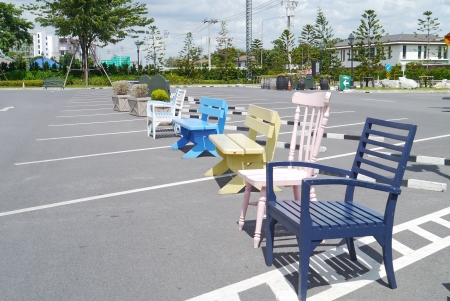 Colorful chairs on sunshine hot.の写真素材