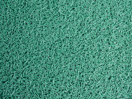 Green door mat texture background.の写真素材