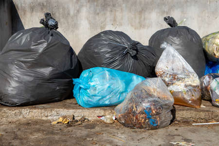 Garbage bag plastic and waste City in the garbage heap of garbage photography background texture...