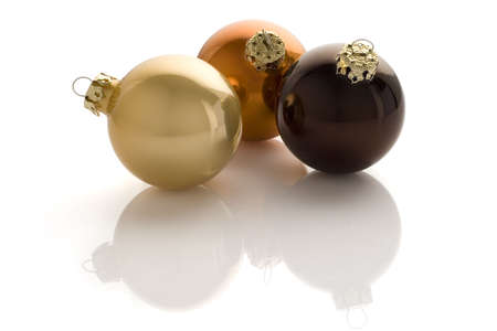 Three christmas balls isolated over a white backgroundの写真素材