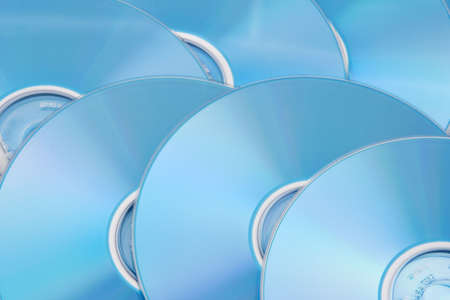 Background picture of colorful DVD disks.の写真素材