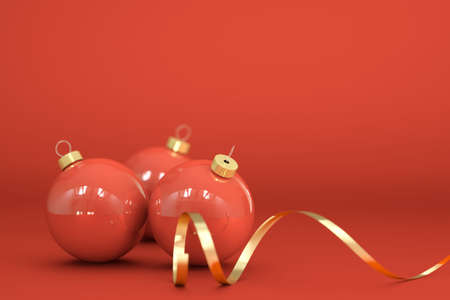 Christmas balls and ornaments over a red background.の写真素材
