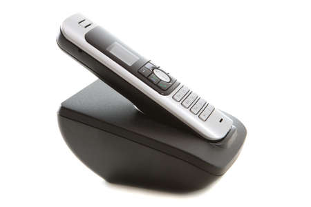 Modern phone set and base station isolated over a white background.の写真素材