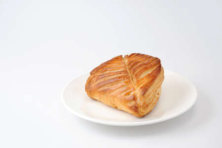 delicious fresh rustic Leaf Apple Pie on a plate on white background