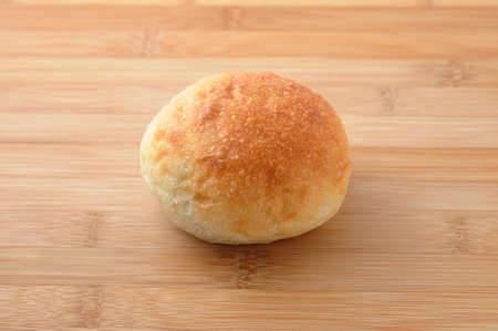round bread isolated on cutting board