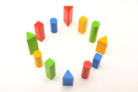 toy aligned wooden blocks multicolor bricks on white background
