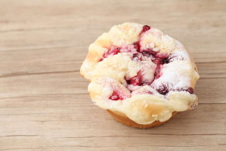 strawberry cheese cream bread cup cake isolated on table