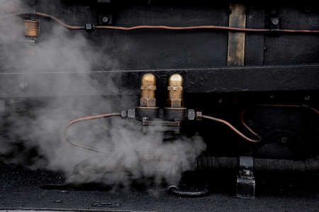 pipes with steam of locomotiveの写真素材