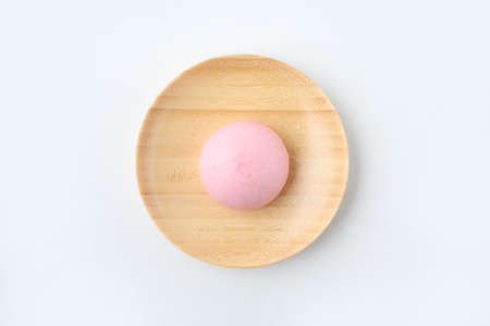 manjyu Japanese traditional confectionery cake wagashi on plate closeup isolated on white backgroundの写真素材