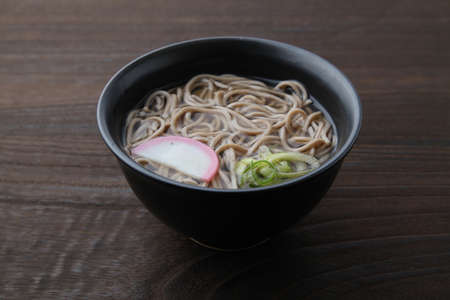 soba buckwheat noodles Japanese isolated on wooden tableの写真素材